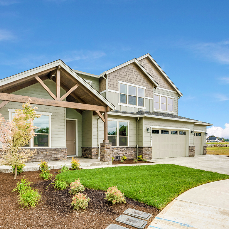 Modern home with landscaped yard
